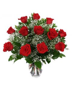 Dozen long stemmed red roses in a glass vase