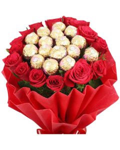 Bouquet of Ferrero Rocher chocolates set amidst red roses
